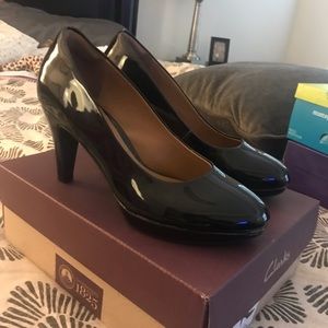 Clark’s patent leather pumps